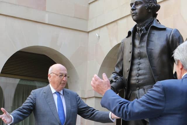 The present Duke unveiling the statue of the 5th Duke of Devonshire
