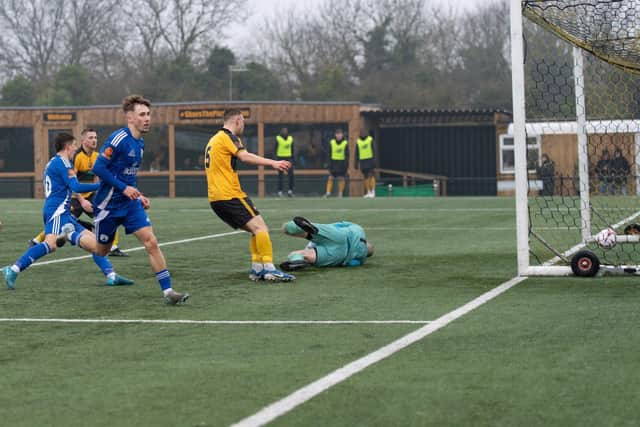Johnny Johnston finds the net for Buxton's third. Photo: Phil Peat.