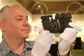 Bret Gaunt of Buxton Museum with a richly carved pipe which will be returned to the descendants of the Haida Indians