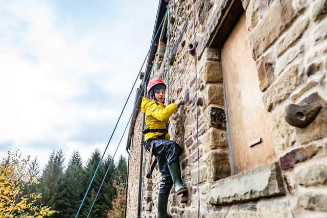 Young person Abseiling at Lockerbook Residential centre 