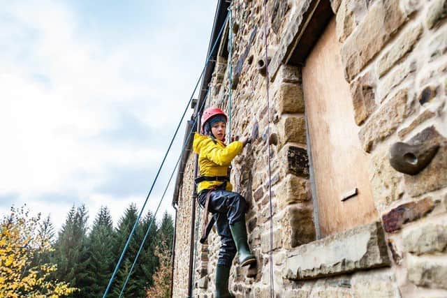 Young person Abseiling at Lockerbook Residential centre
