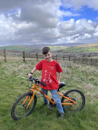 Stanley Gillis is taking on three Manchester United themed biked challenges to raise money for his classmate, Harry Budd, who has been diagnosed with cancer.