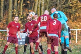 FC Normanton's goalkeeper comes up for a corner at the end of the cup clash with Furness Vale. Photo by Paul Hines.