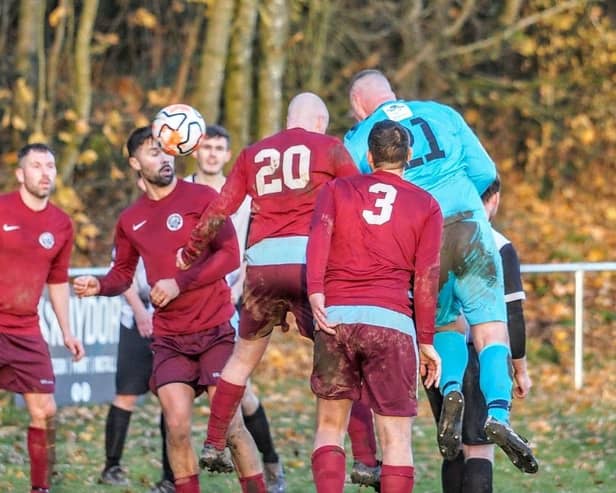 FC Normanton's goalkeeper comes up for a corner at the end of the cup clash with Furness Vale. Photo by Paul Hines.