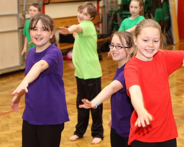 Harpur Hill Primary School practice their Olympic themed routine. Photo Jason Chadwick