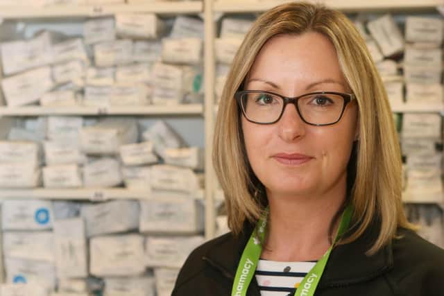Pressure on NHS, Peak Pharmacy's Kirsten Bagshaw in front of just a few of the hundreds of perscriptions waiting for collection