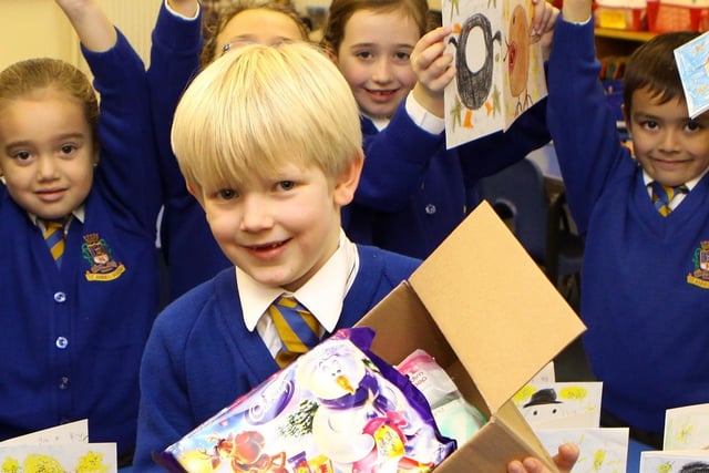 Six year old Will Fletcher-Wells who's father was in the army in November 2011 persuaded his classmates at St Annes RC Primary to make Christmas cards and collect parcels for troops in Afghanistan. Photo Jason Chadwick