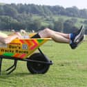 Ben Brindley in his specially prepared wheel barrow. Photo Jason Chadwick
