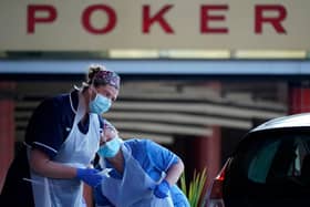 Nurses instruct and help National Health Service (NHS) workers as they self swab for Coronavirus (Covid-19)  (Photo by Christopher Furlong/Getty Images)