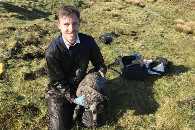 RSPCA inspector Ryan King with the rescued lamb.