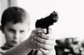 There is no minimum age to hold a shotgun certificate in England and Wales, but a child must be over 14 to have a firearm certificate.