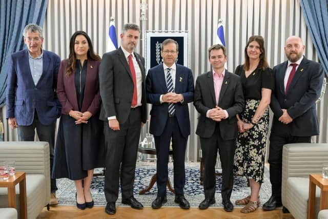 President Isaac Herzog (centre) with LFI chair and High Peak MP Jon Pearce to his left on a Labour Friends of Israel trip. Photo LFI on X previously Twitter