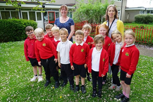 Co acting heads Sarah Hewitt and Sarah Humpleby with some children from Fairfield Infant and Nursery School, celebrate their good Ofsted report. Photo Brian Eyre