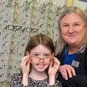 Left to right - Scarlett Devlin, age 8, and Melanie Page, Scrivens Chapel En Le Frith Branch Manager.