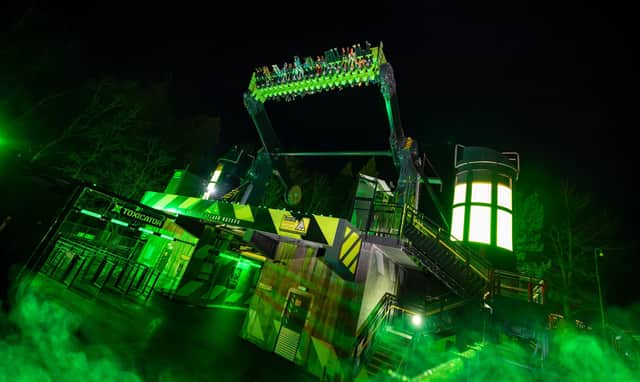 The 78-foot high top-spin Toxicator, the park's newest ride opened this weekend.