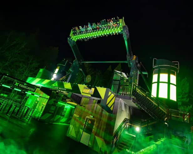 The 78-foot high top-spin Toxicator, the park's newest ride opened this weekend.