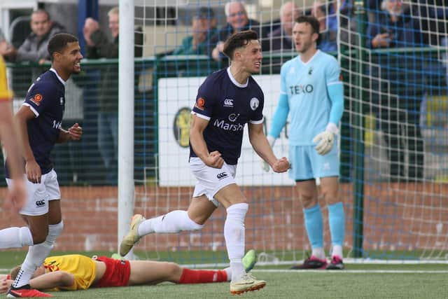 Sam Osborne celebrates the third goal.