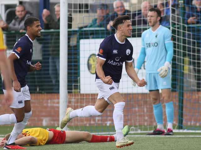Sam Osborne celebrates the third goal.