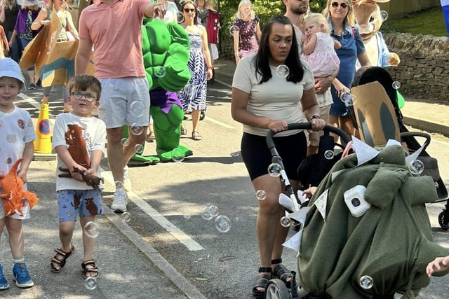Families enjoying the parade. Photo by Polly Williams