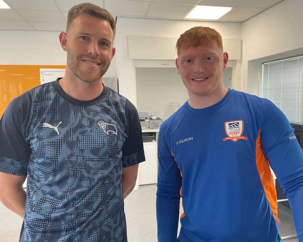 Derby County's Callum Elder (left) with University of Derby student Cy Roach