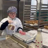 Meg Williams, has been taken on a full time employee after finishing her supported internship at Buxton Pudding Emporium. Photo Buxton and Leek College