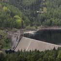 A Lancaster bomber flies over Ladybower reservoir to mark the 70th anniversary of the World War II Dambusters mission on May 16, 2013. (Photo by Christopher Furlong/Getty Images)