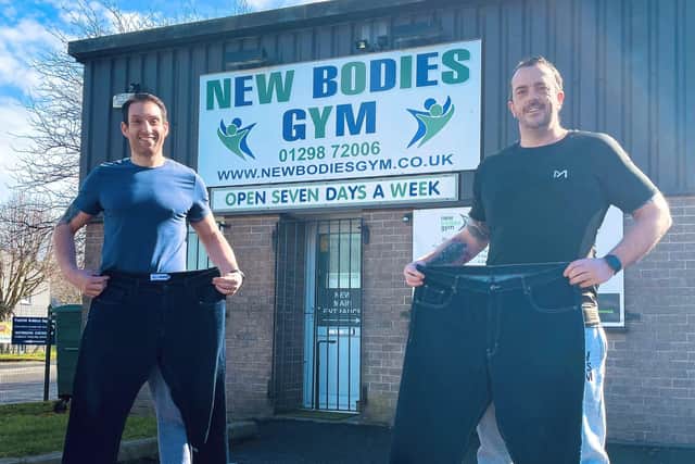 Mark Allard, left, and Scott Bickerton have slimmed down with help from Sarah Ridgeway at New Bodies Gym.