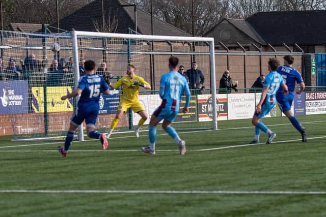 Ethan Mann's volley finds the net. Photo: Phil Peat.