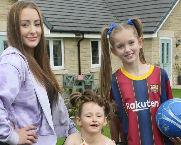 Raegan Furness and daughters Amelia and Kacie. Photo Jason Chadwick