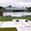 The covers are firmly in place at Derby due to rain.