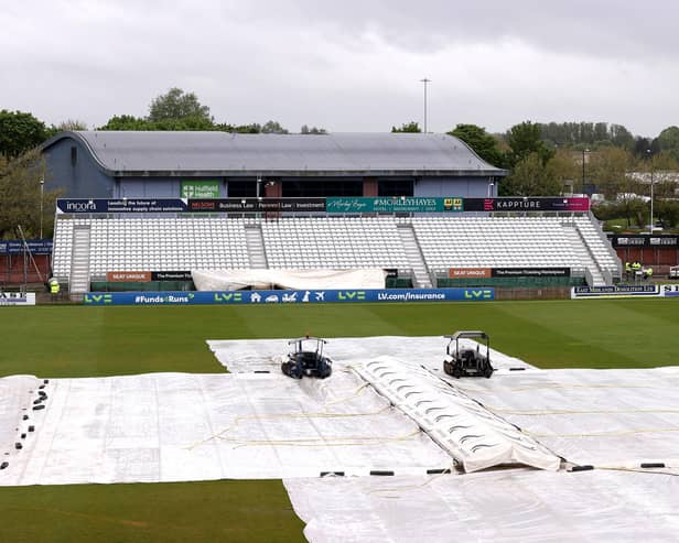 The covers are firmly in place at Derby due to rain.