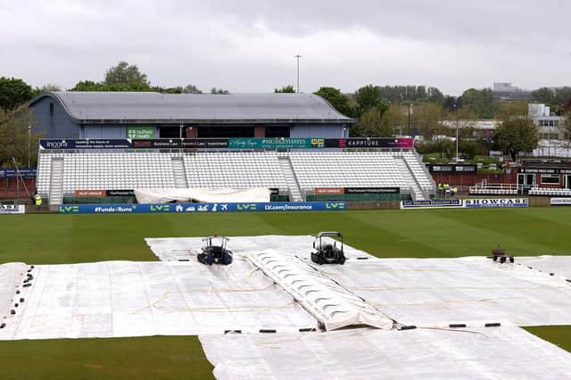 The covers are firmly in place at Derby due to rain.