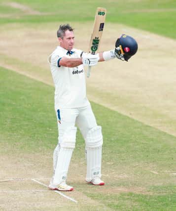 Derbyshire skipper Wayne Madsen celebrates reaching his century on the second day of the Rothesay County Championship Division Two match with Gloucestershire at the Seat Unique Stadium, Bristol. Pic: Jacob Hurry, Gloucestershire CCC.