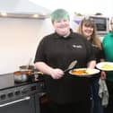 Jane Kirk-Bagshaw with head chef Charlotte Hallam and volunteers Stephanie Bradley and Cameron Fenton-Tracey