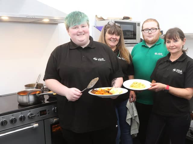 Jane Kirk-Bagshaw with head chef Charlotte Hallam and volunteers Stephanie Bradley and Cameron Fenton-Tracey