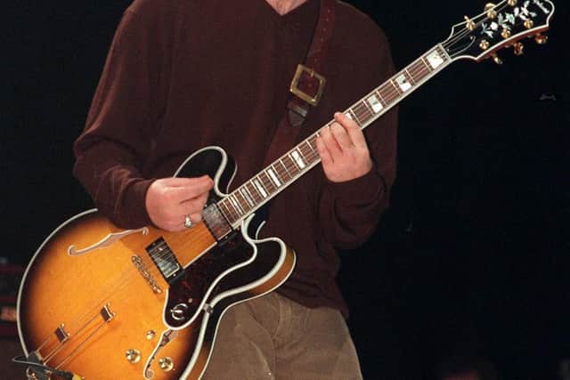 Noel Gallagher on stage at Sheffield Arena in 1997. Picture: Dean Atkins.