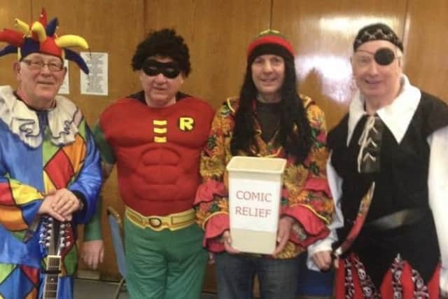 Prior to the Covid pandemic, members of Alfreton Male Voice Choir would don fancy dress to collect money in Alfreton on the Saturday near Red Nose Day. Pictured are: chief busker Mick Mullarkey, John Tate, Peter Singleton and Brian Thornton, left to right.