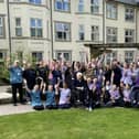 Staff and residents at Haddon Hall Care Home celebrating their latest CQC score.