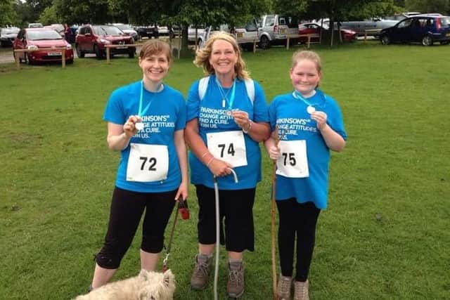 Emma Lewis, left, her mum Jean and sister Jade are passionate supporters of Parkinson's UK.
