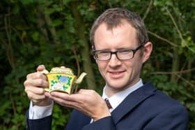 Hansons valuer Edward Rycroft with the imperial Chinese wine ewer.