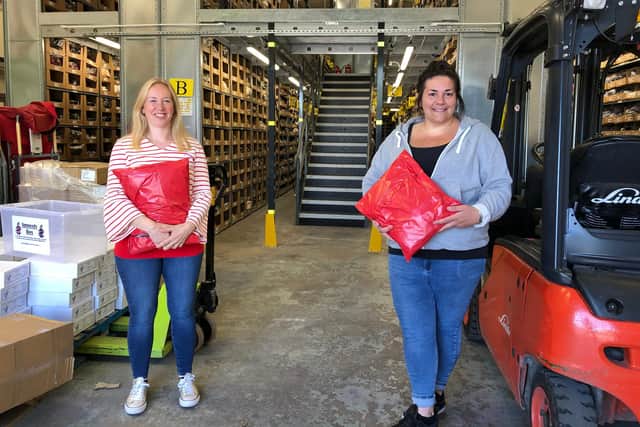 Rachel Kirk Lockley and Danielle Dover and colleagues at lingerie brand Pour Moi's Macclesfield distribution centre are raising money for East Cheshire Hospice.