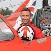 Nick Critchell, current Squadron Leader (Red 3) of the Royal Air Force Aerobatic Team wearing the donated suit. Photo  Ministry of Defence press