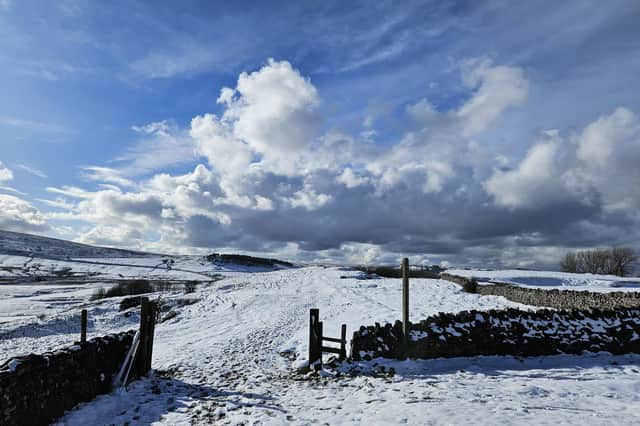 A striking photo by Richard Pattrick, taken on a recent wintry day, shows a snowscape and the view looking west towards the Cat and Fiddle.