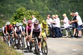 Tour De France Femmes Cyclist Elise Chabbey In The Polka Dot Mountains Jersey Leads The Group. Credit A.S.O & Pauline Ballet. Courtesy Of EMCCA.