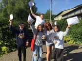 Buxton Community School pupils jumping for joy after reading their GCSE results