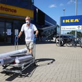 A man leaves with his goods after shopping at Ikea. Picture: Julian Finney/Getty Images.