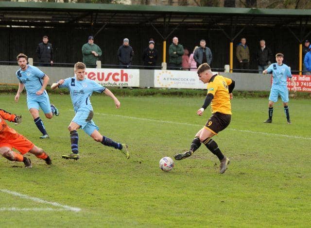 Benito Lowe scores for New Mills last season, which was declared null and void. Boss Birch is hoping to avoid a repeat.