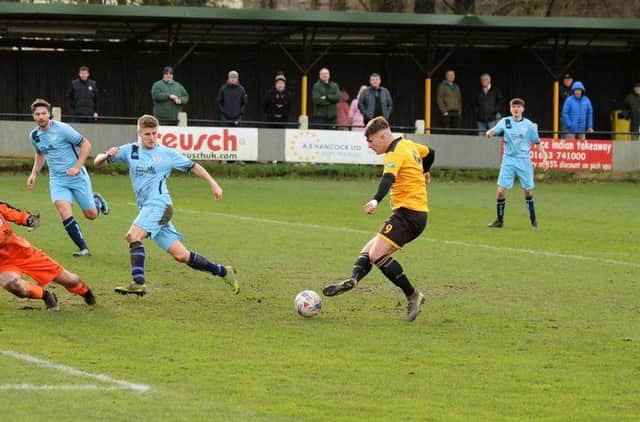 Benito Lowe scores for New Mills last season, which was declared null and void. Boss Birch is hoping to avoid a repeat.