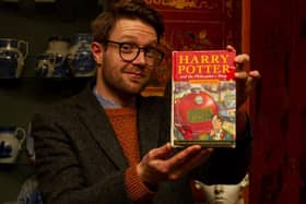 Jim Spencer, head of Hansons' Library Auction, with the hardback Harry Potter book which made £33,000 at auction.