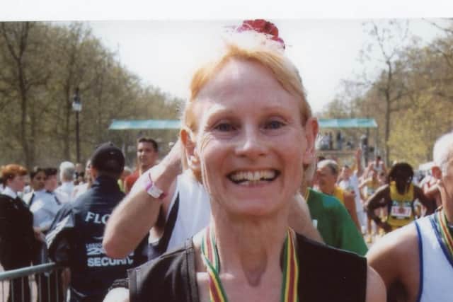 Angela Bent running the London Marathon in 2003